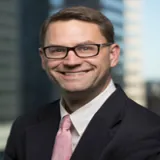 R. Thomas "Tom" Warburton